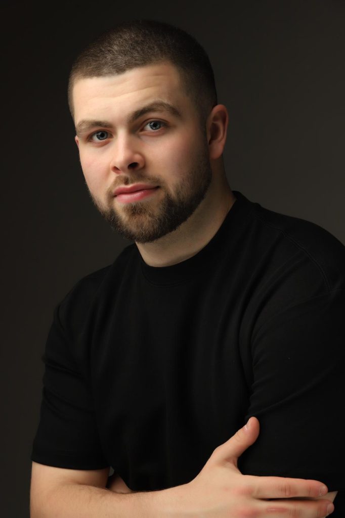 Man with beard, black shirt